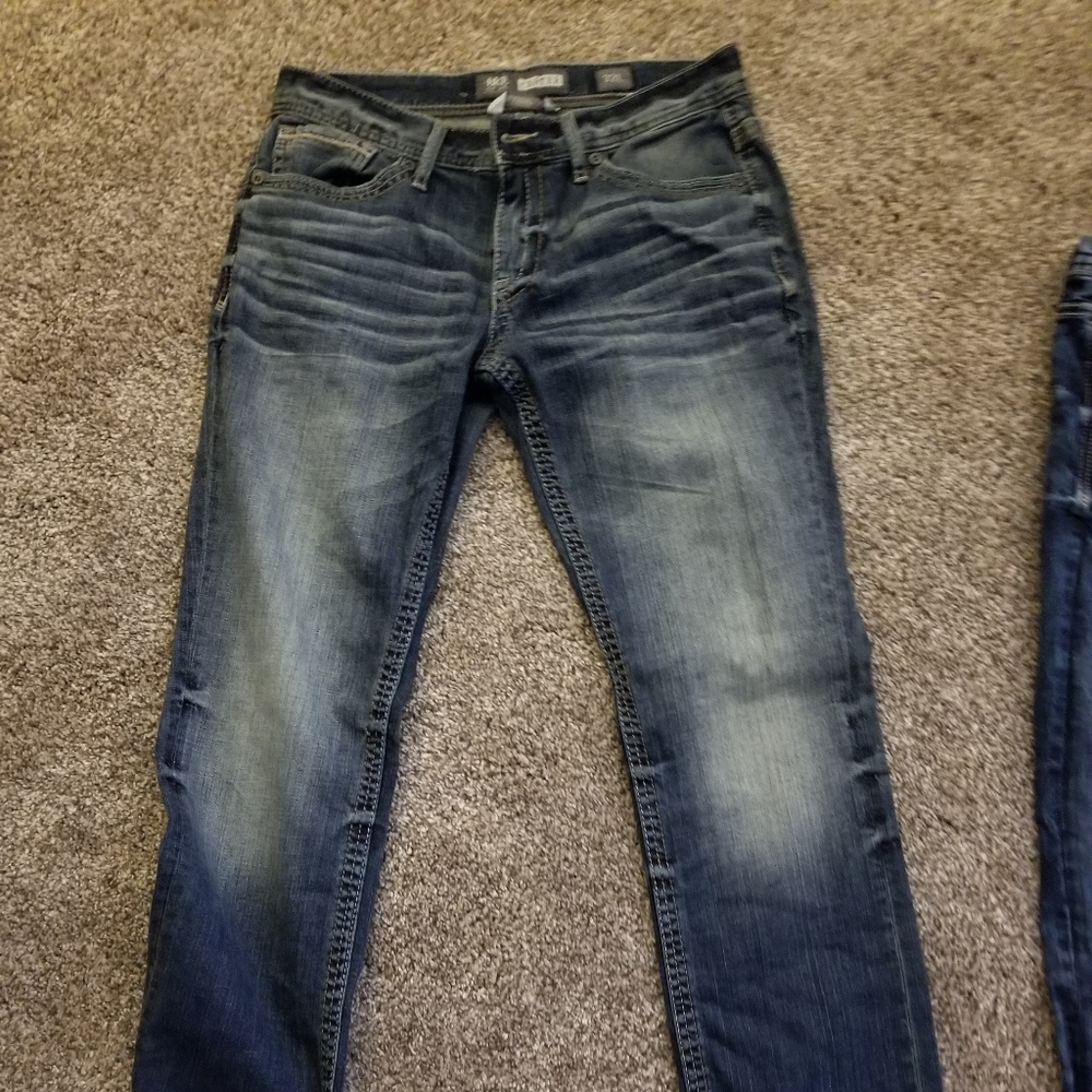 Men's buckle blue jeans